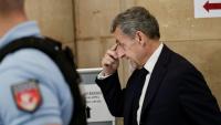 L'ancien président Nicolas Sarkozy arrive au palais de justice de Paris, le 8 avril 2026, pour son procès en appel dans l'affaire du financement libyen de sa campagne électorale de 2007