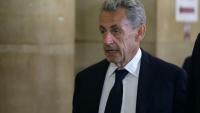 L'ancien président français Nicolas Sarkozy arrive au palais de justice de Paris, le 11 mai 2026, pour son procès en appel dans l'affaire du financement libyen de sa campagne présidentielle de 2007
