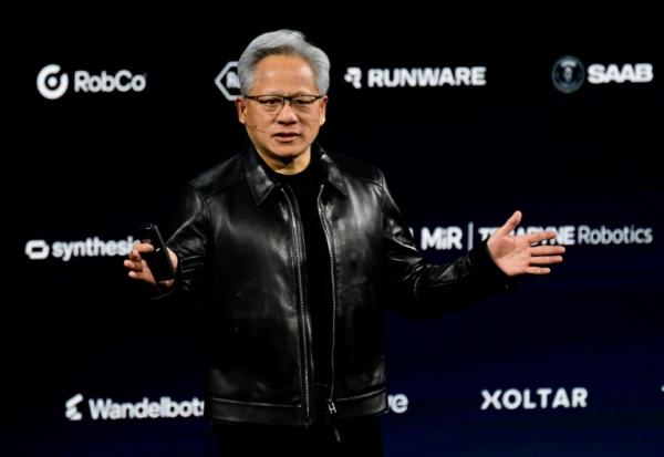 Le patron de Nvidia, Jensen Huang, s'exprime lors d'un événement à Berlin sur l'intelligence artificielle, le 21 Octobre 2026
