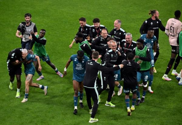 La joie des Messins qui remontent en Ligue 1 après leur succès en barrage retour à Reims, le 29 mai 2025