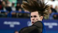 Mikhail Shaidorov lors de son programme libre de patinage artistique le 13 février 2026 sur la patinoire de Milan
où le Kazakhstanais a été sacré champion olympique au terme d'une soirée où le favori américain Ilia Malinin est passé au travers
