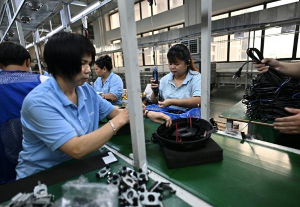 Dans l'usine d'aspirateurs Rimoo de Foshan, près de Canton, en Chine, le 28 avril 2026