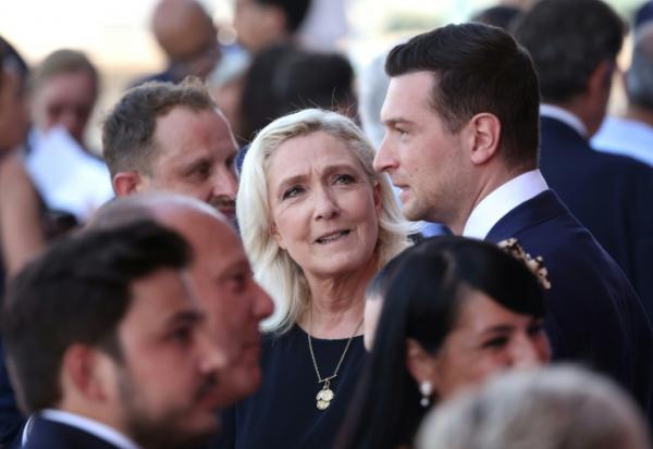 La candidate RN à l'élection présidentielle Marine Le Pen et le président du parti Jordan Bardella à Nice dans les Alpes-Maritimes le 14 juillet 2026