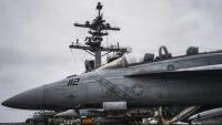 Sur cette image diffusée par l'armée américaine figure un chasseur F/A-18 Super Hornet, stationné sur le pont du porte-avions George Washington, le 4 septembre 2026 en mer