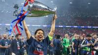 Marquinhos et le reste du Paris Saint-Germain célèbrent leur victoire en Ligue des Champions face à Arsenal, le 30 mai 2026 au Puskas Arena de Budapest