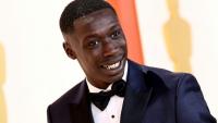 Le Tiktokeur Khaby Lame assiste à la cérémonie des Oscars, le 12 mars 2023 à Hollywood, en Californie