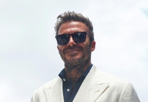MIAMI, FLORIDE - 08 MAI : David Beckham sourit dans le paddock avant le Grand Prix de F1 de Miami à l'autodrome international de Miami le 08 mai 2022 à Miami, Floride.   Jared C. Tilton/Getty Images/AFP