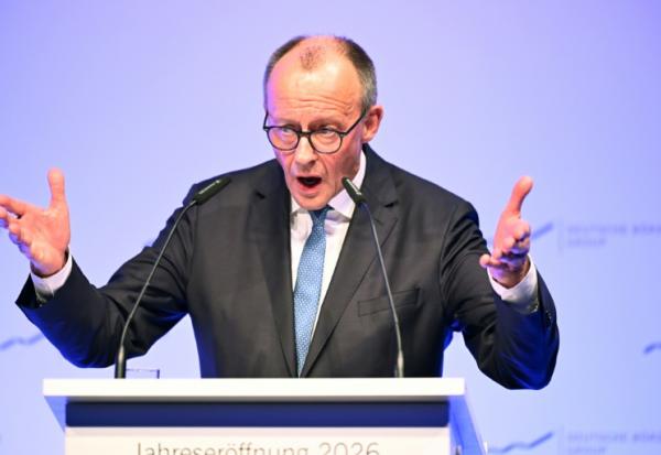 German Chancellor Friedrich Merz delivers a speech at the annual reception of the stock exchange operator Deutsche Boerse in Eschborn, western Germany, on February 2, 2026. 