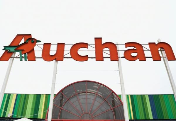 en difficulté, Auchan prévoit de basculer sous bannière Intermarché et Netto en franchise ses quelque 300 supermarchés