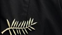Une épingle en forme de Palme d'or, le 21 mai 2025 au festival de Cannes