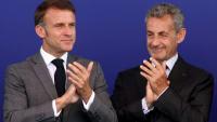 Emmanuel Macron (g) et Nicolas Sarkozy lors de l'inauguration du terminus de la ligne 14 du métro parisien, à Saint-Denis, le 24 juin 2024