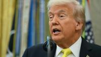 Le président américain Donald Trump dans le Bureau ovale de la Maison Blanche, le 15 octobre 2025 à Washington