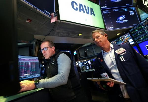 Des opérateurs à la Bourse de New York le 19 mai 2026