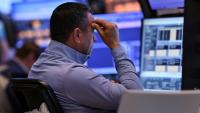 Un opérateur à la Bourse de New York, le 12 mai 2025.