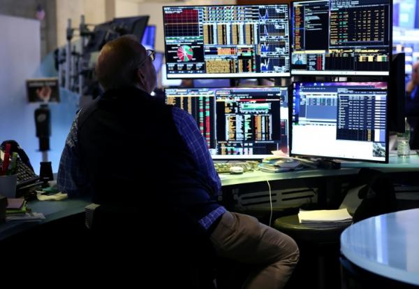 Un opérateur à la Bourse de New York, le 13 avril 2026